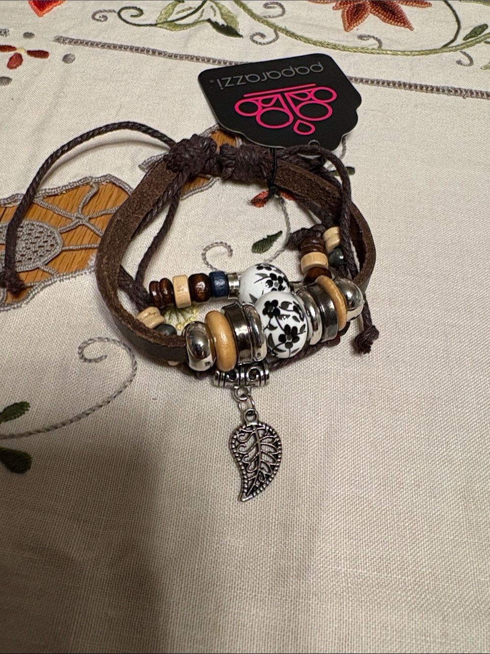 paparazzi Brown and White Boho Leather Wrap Bracelet with Leaf Charm 3 in one.
